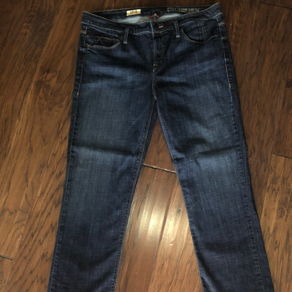 Sold Design Lab Dark Wash Jeans.